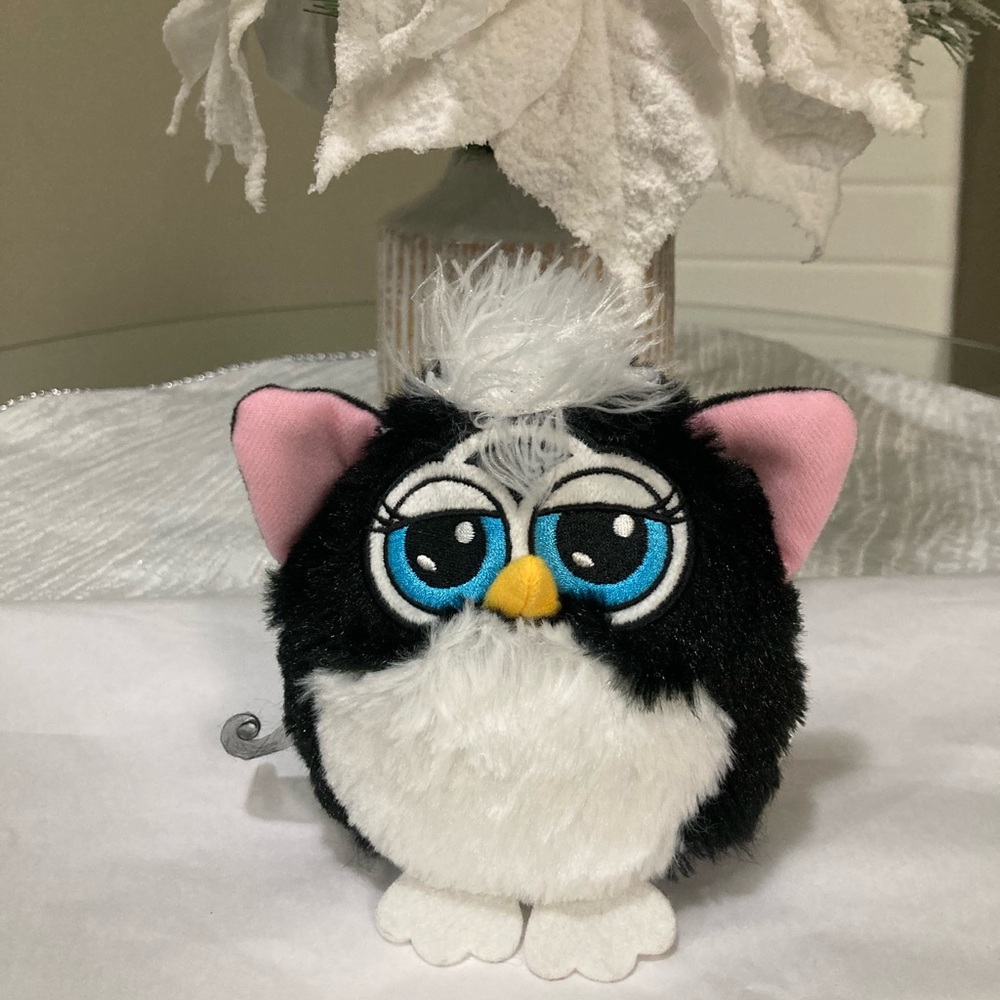 Hasbro Black and White Stuffed Animal with Blue Eyes